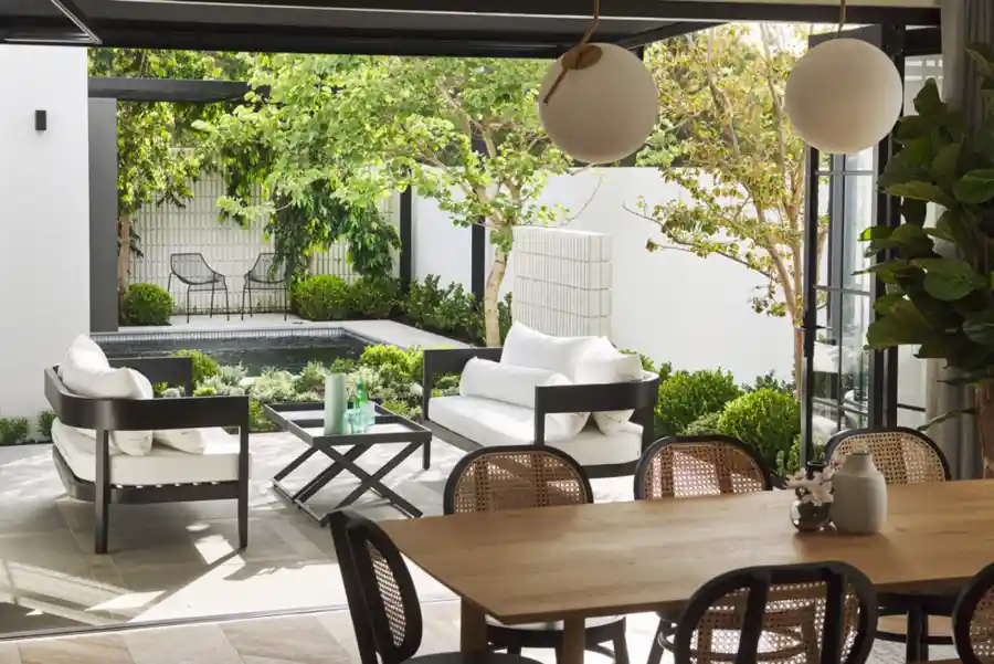 modern outdoor area with seating and pool